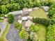 An aerial perspective reveals a well-maintained property, numerous buildings, and ample parking space at 1733 S Nc 16 Business Hwy, Stanley, NC 28164