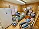 Small bedroom with linoleum floors, wood paneling, and a mix of furnishings at 1733 S Nc 16 Business Hwy, Stanley, NC 28164