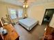 Bright bedroom with neutral carpeting, a ceiling fan, and natural light at 1733 S Nc 16 Business Hwy, Stanley, NC 28164