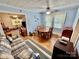 Bright dining room with hardwood floors and a view into the living room at 1733 S Nc 16 Business Hwy, Stanley, NC 28164