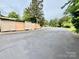 Paved parking area for outbuildings offers ample parking and storage opportunities at 1733 S Nc 16 Business Hwy, Stanley, NC 28164