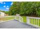Back deck offering outdoor space with views of green grass and a treed yard at 1812 Alpine Dr, Kings Mountain, NC 28086