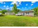 Spacious backyard with lush lawn, privacy fence, and mature shade trees at 1812 Alpine Dr, Kings Mountain, NC 28086