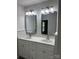 Bright bathroom featuring double sinks with modern lighting and a clean, updated vanity at 2015 Downey St, Rock Hill, SC 29732