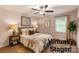 Cozy bedroom with natural light, neutral colors, and ample space at 2015 Downey St, Rock Hill, SC 29732