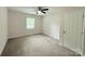 Spacious bedroom with neutral carpet, a ceiling fan, and window bringing natural light at 2015 Downey St, Rock Hill, SC 29732