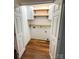 Walk-in pantry offers ample storage with built-in shelves and shiplap accent wall at 2015 Downey St, Rock Hill, SC 29732