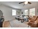 Bright and cozy living room with hardwood floors and a comfortable seating area at 203 Lincoln St, Belmont, NC 28012