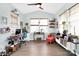 Bright office space featuring a vaulted ceiling, large windows, and stylish decor at 2210 Winding River Dr, Charlotte, NC 28214