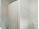Bathroom featuring a toilet, towel rack and shower with curtain at 2234 Dion Ave, Charlotte, NC 28212