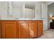 Elegant bathroom featuring double sinks, vanity, large mirror, and good lighting at 2234 Dion Ave, Charlotte, NC 28212