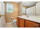 Well-lit bathroom with a sink, a toilet, a mirror and a towel rack at 2234 Dion Ave, Charlotte, NC 28212