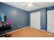 Spacious bedroom features a ceiling fan and a storage closet at 2234 Dion Ave, Charlotte, NC 28212