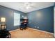 Spacious bedroom features a ceiling fan and an abundance of natural light at 2234 Dion Ave, Charlotte, NC 28212