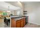 Kitchen area with stainless steel sink and view of dining area and living room at 2234 Dion Ave, Charlotte, NC 28212