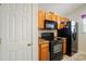 A well-maintained kitchen area is complete with appliances and cabinetry at 2234 Dion Ave, Charlotte, NC 28212