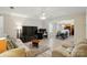 Spacious living room flows into dining area, featuring light hardwood floors and neutral décor at 2234 Dion Ave, Charlotte, NC 28212