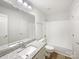 Bathroom featuring granite countertop, stylish cabinets, and tub with shower at 2312 Christensens Ct, Charlotte, NC 28270