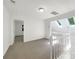 Upstairs bedroom featuring skylights, neutral carpet, and freshly painted walls at 2312 Christensens Ct, Charlotte, NC 28270