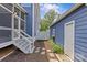 View of the side yard featuring a small privacy fence and access to the garage at 2315 Winthrop Ave, Charlotte, NC 28203