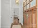 Bright entryway with hardwood floors, a decorative door, and a view into the living spaces at 2315 Winthrop Ave, Charlotte, NC 28203