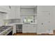 Well-lit kitchen featuring a stainless steel sink, modern appliances, and a window with natural light at 2315 Winthrop Ave, Charlotte, NC 28203