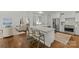 Bright open-concept kitchen with a center island, connecting seamlessly to the living and dining areas at 2315 Winthrop Ave, Charlotte, NC 28203