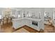 Modern, open floor plan with a sleek kitchen island, dining area, and cozy seating at 2315 Winthrop Ave, Charlotte, NC 28203