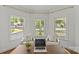 Bright office nook with natural light, comfortable seating, and views of the front yard at 2315 Winthrop Ave, Charlotte, NC 28203