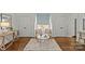 Bright sitting area with cozy chairs and a rug, perfect for reading or relaxing at 2315 Winthrop Ave, Charlotte, NC 28203