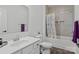 Clean bathroom featuring a tub with a colorful shower curtain and a single sink vanity at 3127 Pinehills Way, Mount Holly, NC 28120