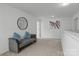 Bright loft area with comfortable seating and neutral decor at 3127 Pinehills Way, Mount Holly, NC 28120
