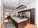 Contemporary kitchen with stainless steel appliances, large island, and an open concept design at 314 Viburnum Way Ct, Charlotte, NC 28208
