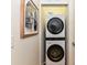 Efficient laundry closet with stacked washer and dryer, maximizing space and convenience in a modern home at 314 Viburnum Way Ct, Charlotte, NC 28208