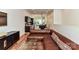 Open-concept living room showcasing hardwood floors, modern decor, and a seamless flow to the kitchen at 314 Viburnum Way Ct, Charlotte, NC 28208