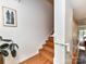 Elegant oak stairway featuring a modern handrail and stylish decor creates a warm, inviting entrance to the home at 314 Viburnum Way Ct, Charlotte, NC 28208