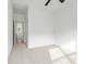 Bedroom with plush carpeting and a view of the hallway leading to other parts of the house at 3928 Hager Dr, Charlotte, NC 28208