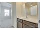 Tastefully designed bathroom features a modern vanity, a sink, and neutral tones, for a clean and stylish look at 4051 Whittier Ln, Fort Mill, SC 29708