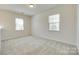 Bright bedroom with large windows and neutral carpet at 4051 Whittier Ln, Fort Mill, SC 29708
