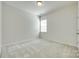 Spacious bedroom with large windows and neutral carpet at 4051 Whittier Ln, Fort Mill, SC 29708