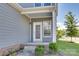Inviting side entrance featuring a charming porch, perfect for a warm welcome to this lovely home at 4051 Whittier Ln, Fort Mill, SC 29708