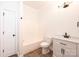 Bathroom features a combination tub and shower, tile floors, and single sink vanity at 4431 1St Street Nw Dr, Hickory, NC 28601