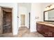 Bathroom includes granite vanity, walk in shower with tile and seating, with ceramic tile flooring at 4431 1St Street Nw Dr, Hickory, NC 28601