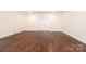 Spacious bonus room with hardwood floors and double door closet offers versatile space at 4431 1St Street Nw Dr, Hickory, NC 28601