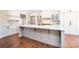 Gourmet kitchen featuring granite countertops, large island, and stainless steel appliances at 4431 1St Street Nw Dr, Hickory, NC 28601