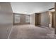 Spacious bedroom with plush carpeting and natural light streaming through the double windows at 5008 Social Cir, Fort Mill, SC 29707