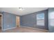 Bedroom featuring neutral walls and a window providing ample natural light at 5008 Social Cir, Fort Mill, SC 29707