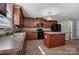 Bright kitchen features ample counter space, a center island, and stainless steel appliances at 5008 Social Cir, Fort Mill, SC 29707