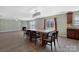 Inviting living space with a fireplace, large windows, and an adjacent dining area at 5008 Social Cir, Fort Mill, SC 29707