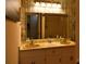 A traditional bathroom featuring double sinks, a large mirror, and ample lighting at 7448 Forney Hill Rd, Denver, NC 28037